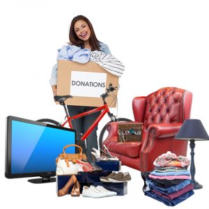 Girl with furniture, clothing, and electronic donations